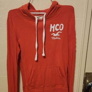 Orange hollister hoodie size medium